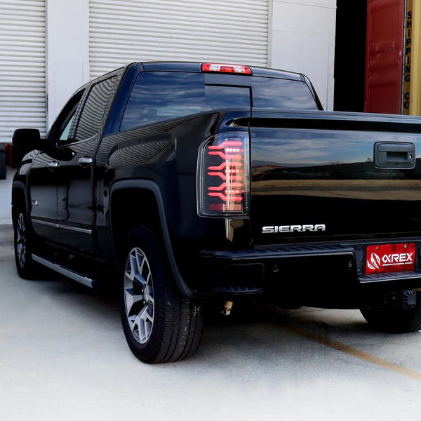 AlphaRex 630050 LUXX Series Black/Red LED Tail Lights | 2014-2018 GM Chevrolet Sierra 2500HD/3500HD