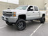 AlphaRex 880224 PRO Halogen Black Headlights | 2015-2019 GM Chevrolet Silverado 2500HD/3500HD