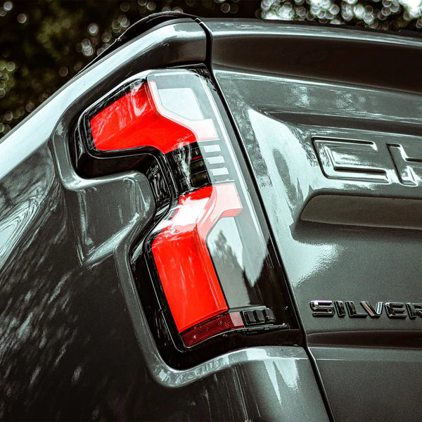 AlphaRex 620078 LUXX-Series LED Tail Lights - Alpha-Black | 2020-2025 GM Chevrolet Silverado 2500HD/3500HD