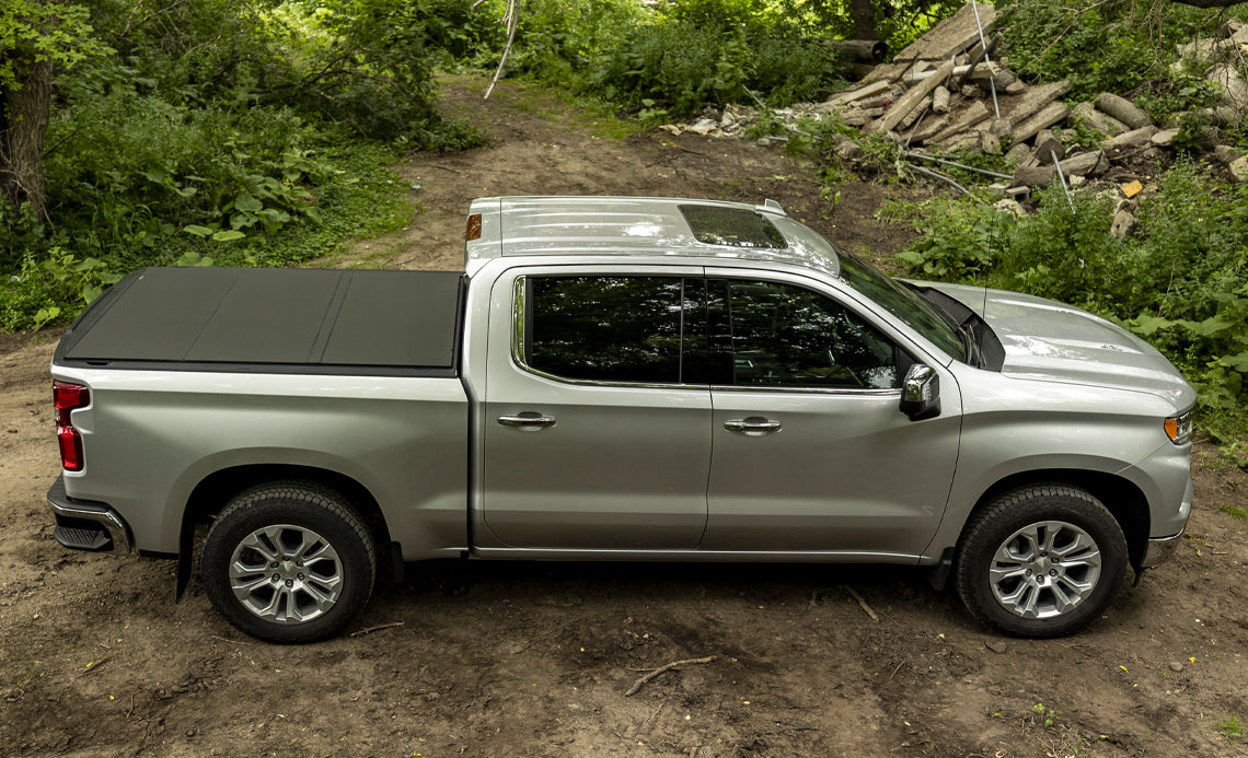 ACI B1040069 Lomax Hard Tri-Fold Tonneau Cover Matte Black | 2019-2022 RAM 2500/3500 6.5ft Bed