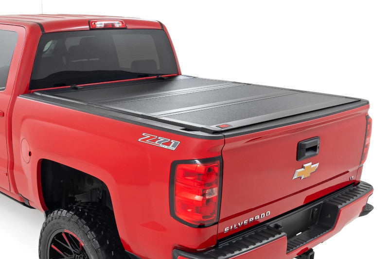 Rough Country 49119551 Hard Tri-Fold Flip Up Bed Cover | 2014-2019 GM Silverado/Sierra 2500HD/3500HD 5.8ft Bed