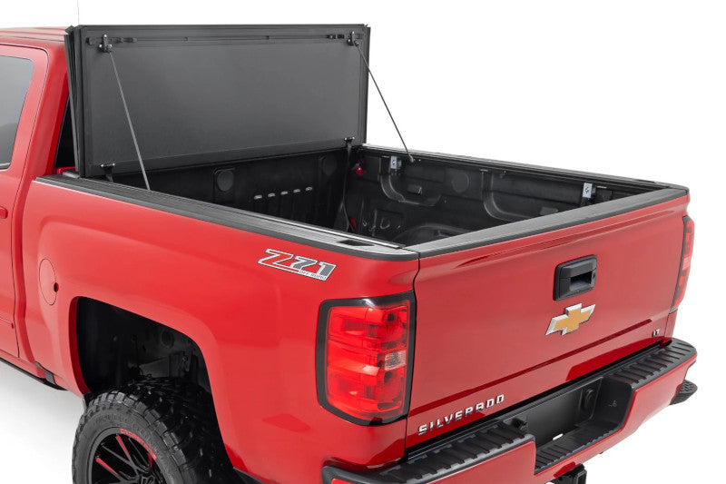 Rough Country 49119551 Hard Tri-Fold Flip Up Bed Cover | 2014-2019 GM Silverado/Sierra 2500HD/3500HD 5.8ft Bed
