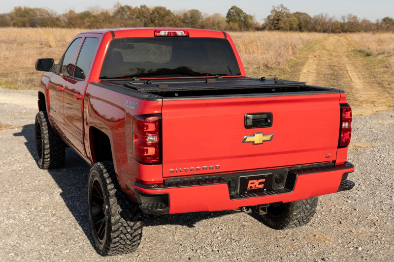 Rough Country 49119551 Hard Tri-Fold Flip Up Bed Cover | 2014-2019 GM Silverado/Sierra 2500HD/3500HD 5.8ft Bed