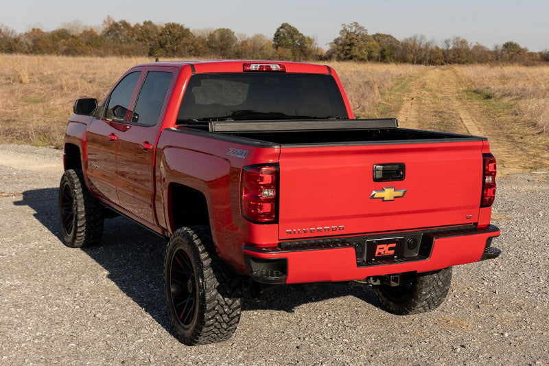 Rough Country 49119551 Hard Tri-Fold Flip Up Bed Cover | 2014-2019 GM Silverado/Sierra 2500HD/3500HD 5.8ft Bed