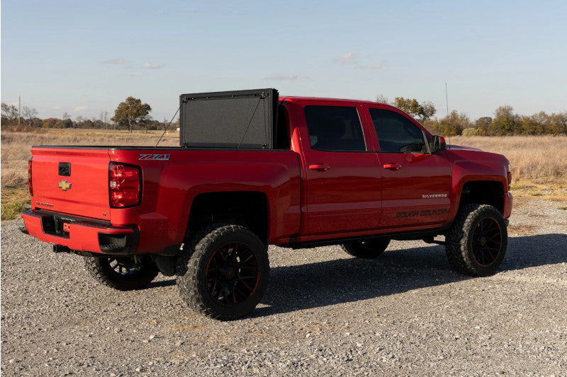 Rough Country 49119551 Hard Tri-Fold Flip Up Bed Cover | 2014-2019 GM Silverado/Sierra 2500HD/3500HD 5.8ft Bed