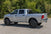 Rough Country 49318650 Hard Tri-Fold Flip Up Bed Cover | 2011-2026 RAM 2500/3500 6.5ft Bed w/o RamBox