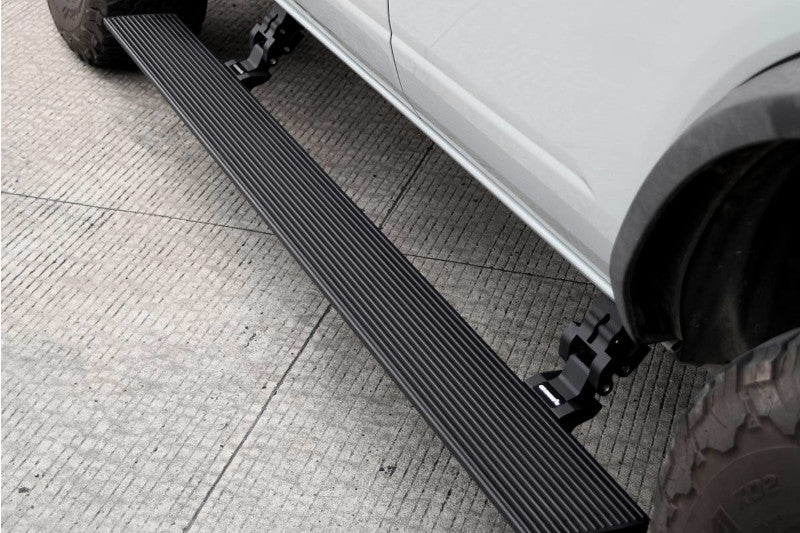 Go Rhino 20404280T E1 Electric Running Board Kit (Bedliner) | 2015-2019 GM Silverado/Sierra 2500HD/3500HD Extended Cab